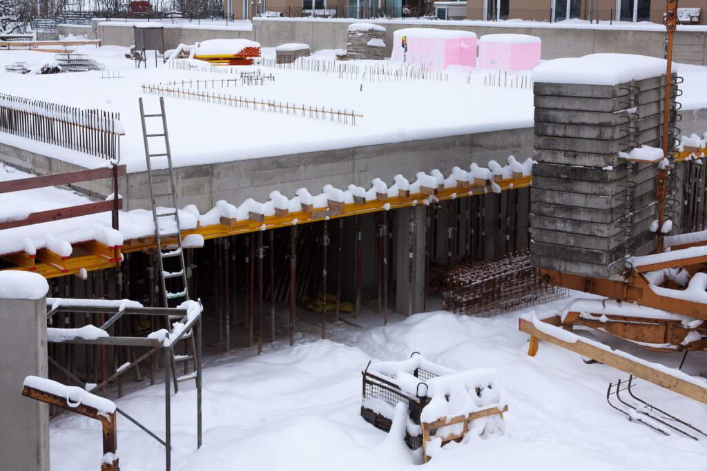 Construction site covered by snow